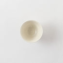 白瓷花文中汲出